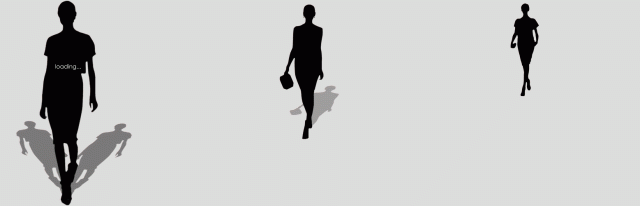 Silhouettes of models walking down a runway. Closest one has loading...written on her